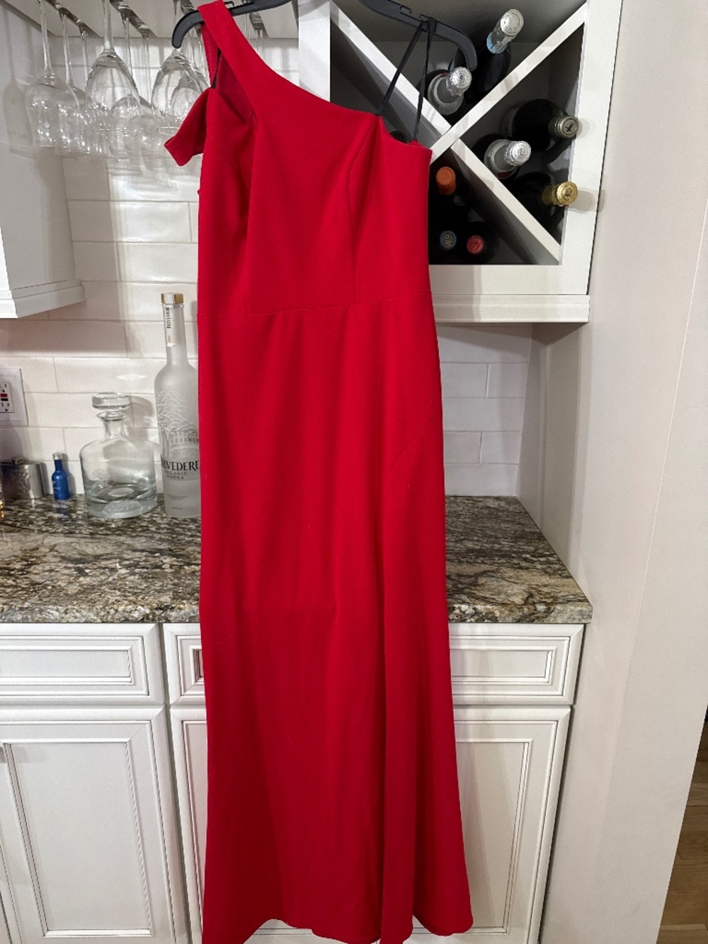 Red, one-shouldered, long dress.